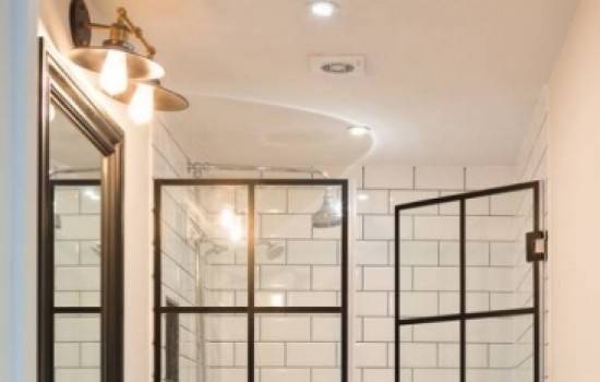 Top Shelf specializes in custom frameless shower doors.